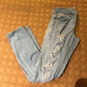 Light blue ripped skinny jeans